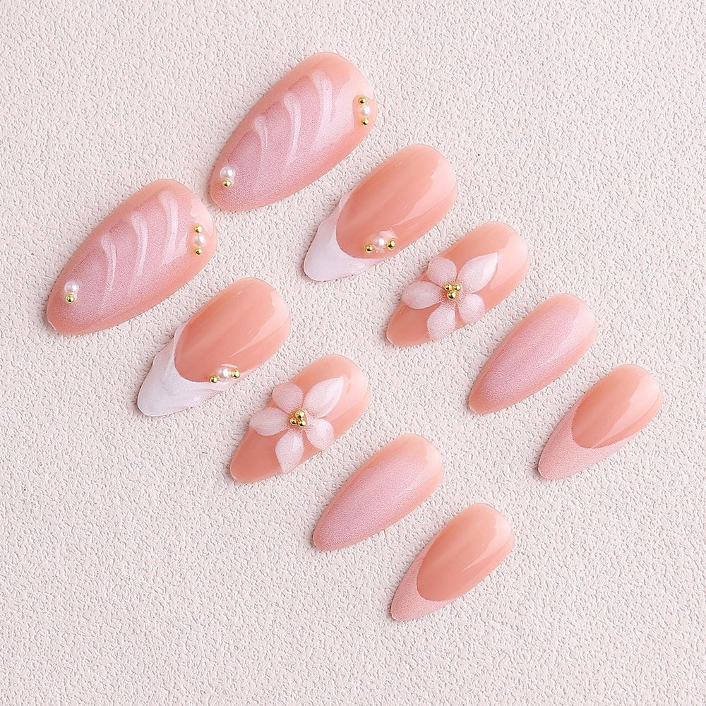 OCOUYVD 3D flower pearl design nails add fashion-forward detail to any outfit.