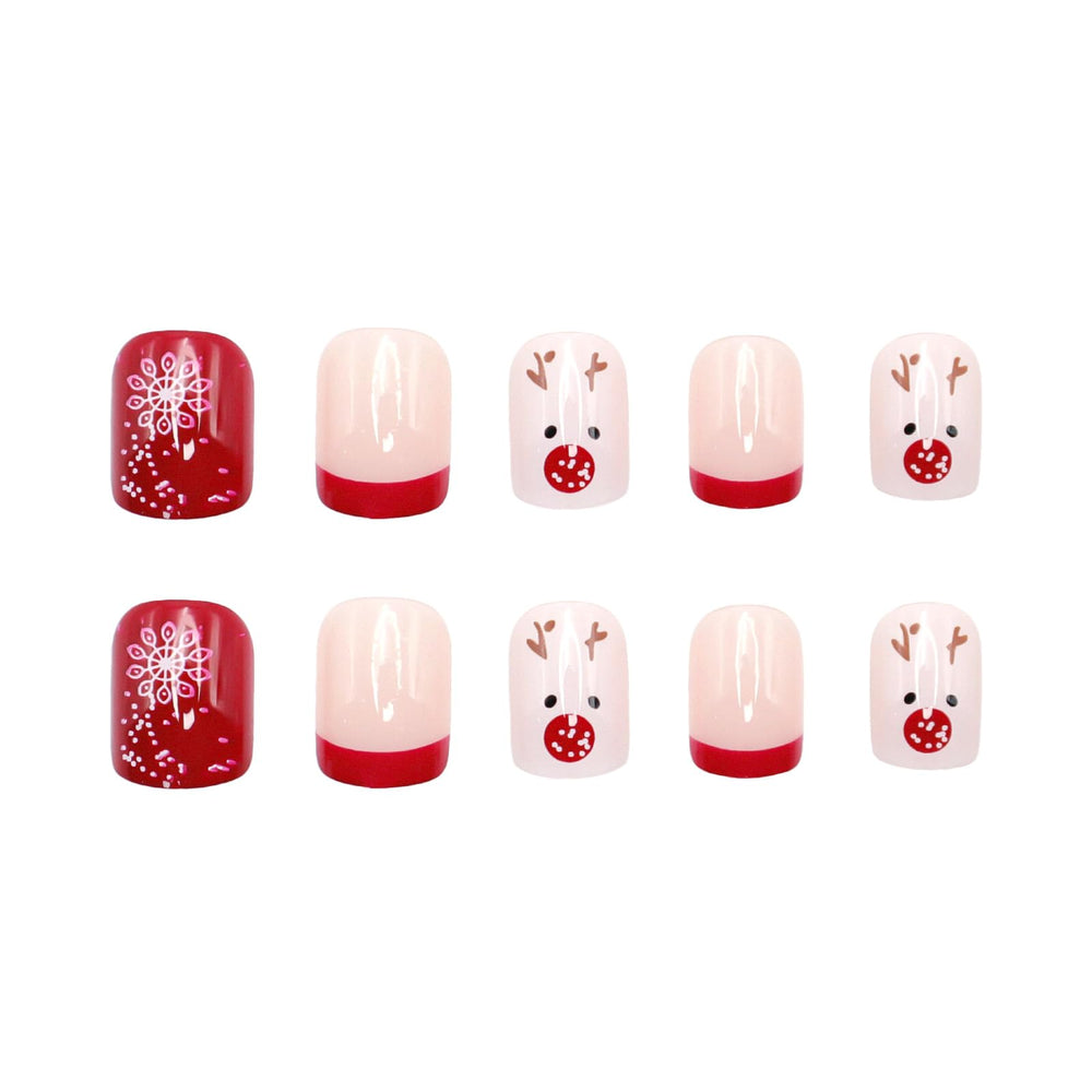 OCOUYVD Christmas nails package contents show glue and tools for quick at-home application.