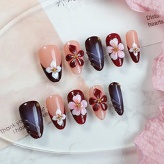 OCOUYVD nails featuring golden steel ball accents for a statement touch.