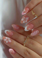 OCOUYVD flower press-on nails pearls close-up for elegant DIY manicure.