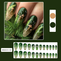 OCOUYVD green glitter nails with mushroom and leaf designs, ideal for spring events
