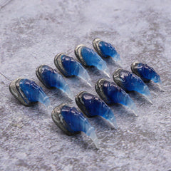 OCOUYVD Halloween nails featuring gleaming eagle claw design for dramatic party nails.