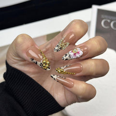 OCOUYVD Long almond nails with 3D butterfly rhinestones for elegant party looks