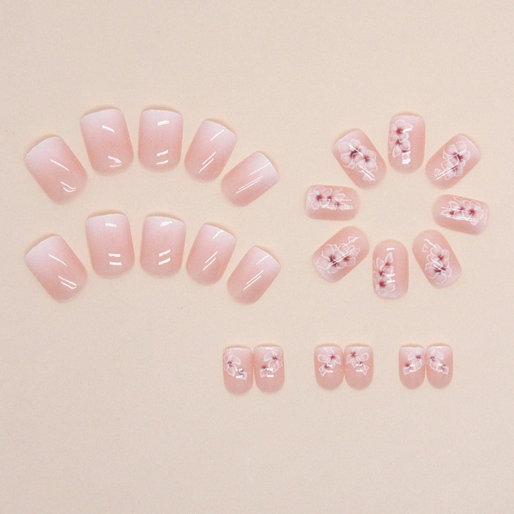 OCOUYVD square nails with flower design in a soft pastel gradient for party-ready style.