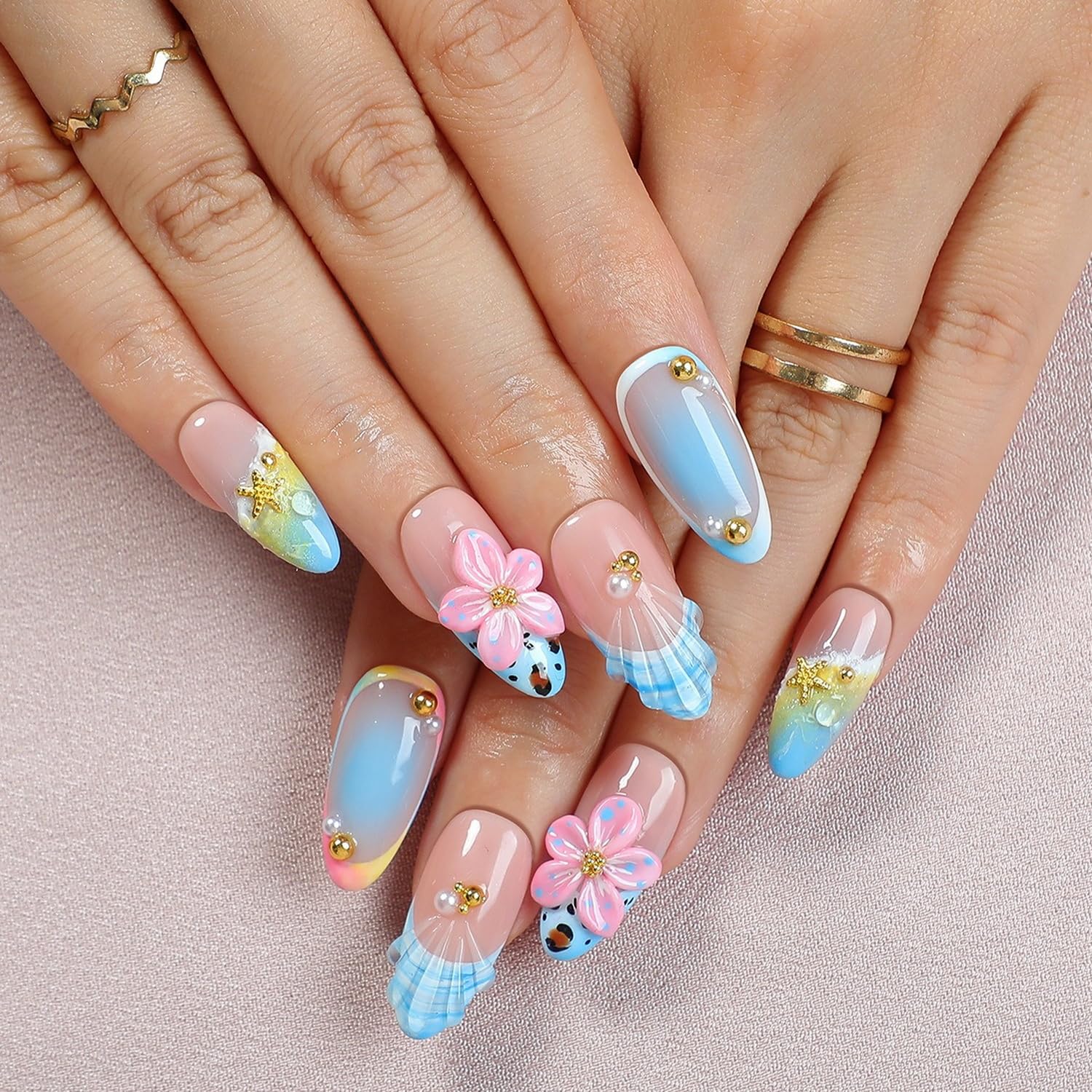 OCOUYVD starfish pearl embellished nails with oceanic charm