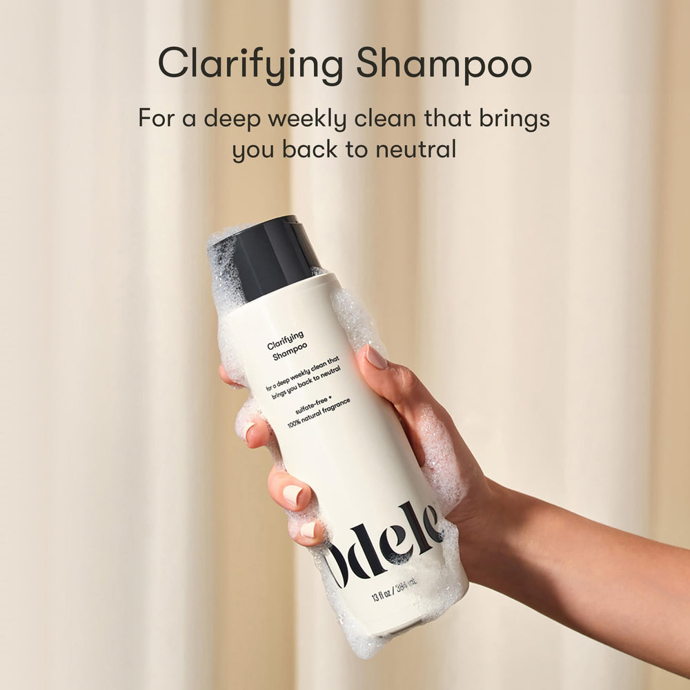 Odele Clarifying Shampoo bottle pour demonstrates easy weekly application for buildup removal.