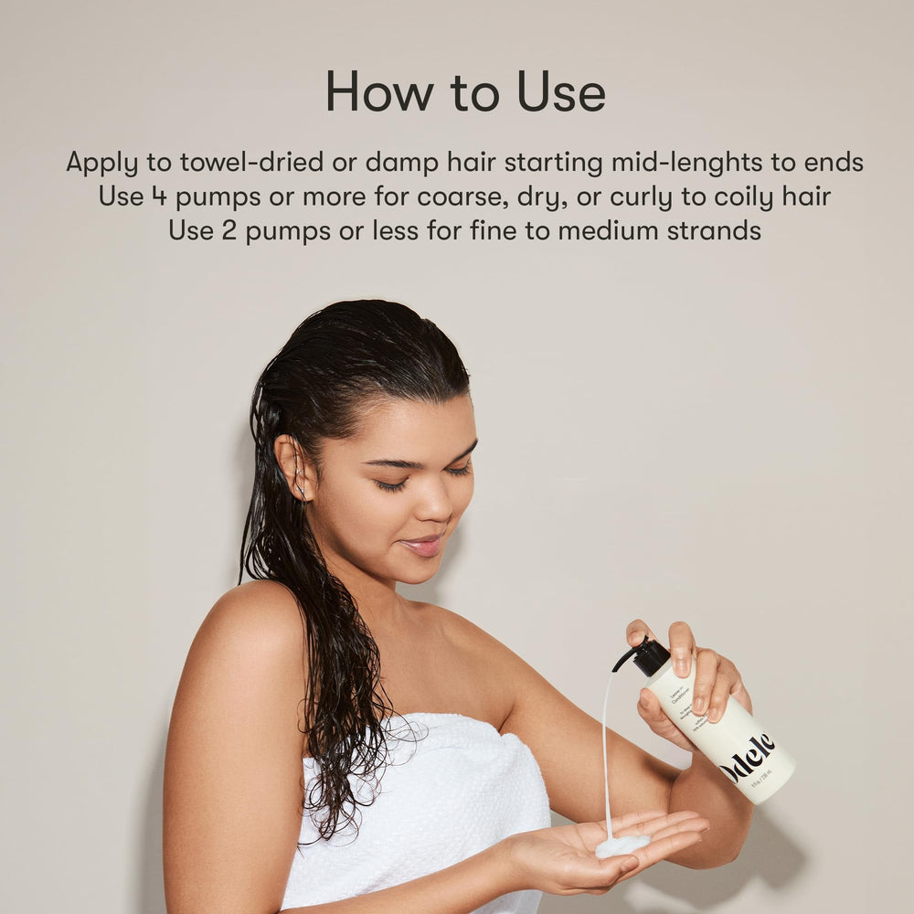 Hair with damp strands using Odele leave-in for detangling