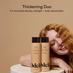 Odele thickening conditioner bottle closeup highlights nourishing formula for stronger strands