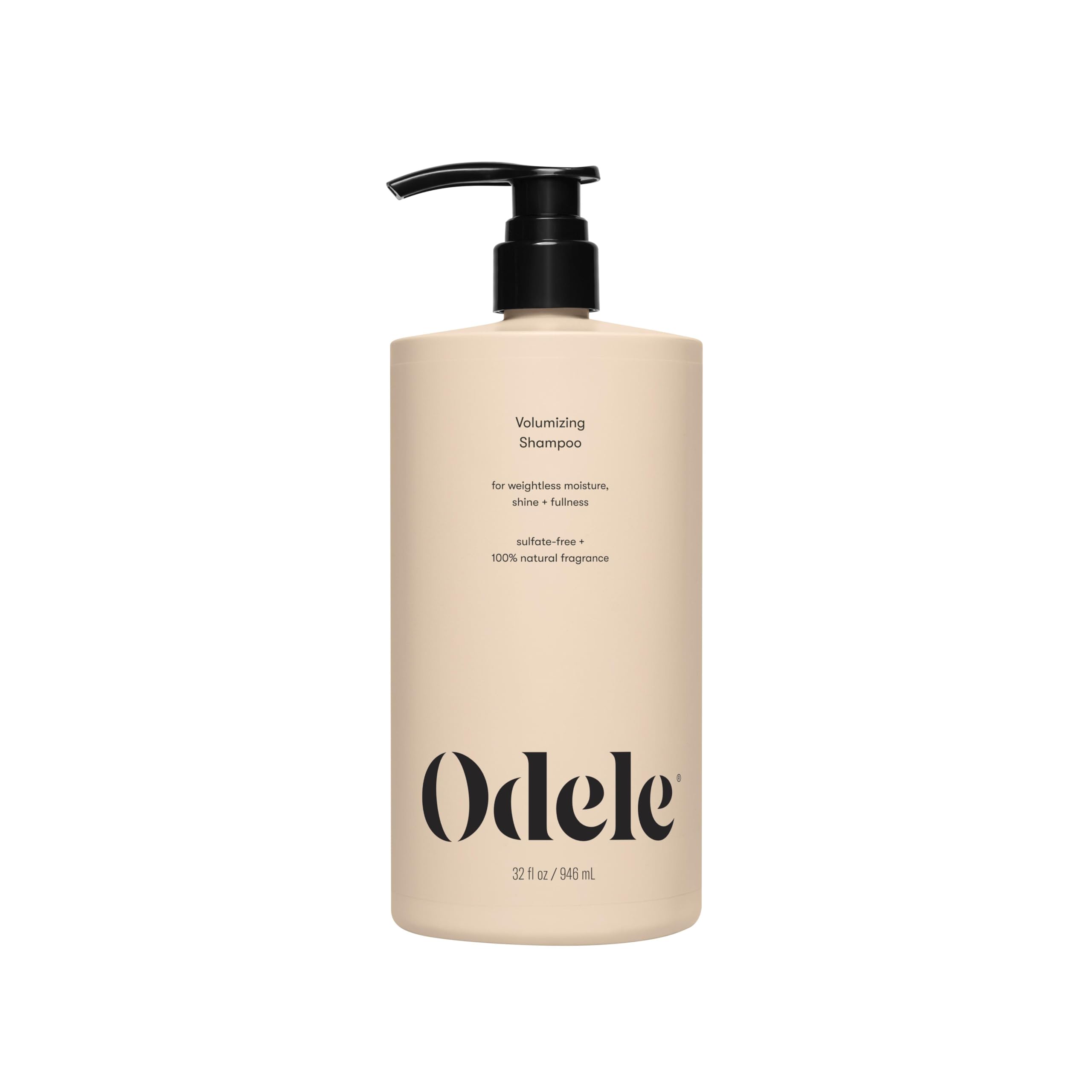 Odele Volumizing Shampoo bottle on a vanity, for lightweight cleansing and shine.