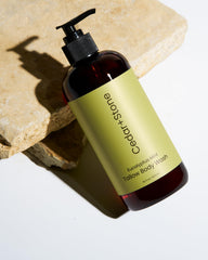 OfficeKit Cedar + Stone Clean Body Wash gel texture with silky lather close-up.
