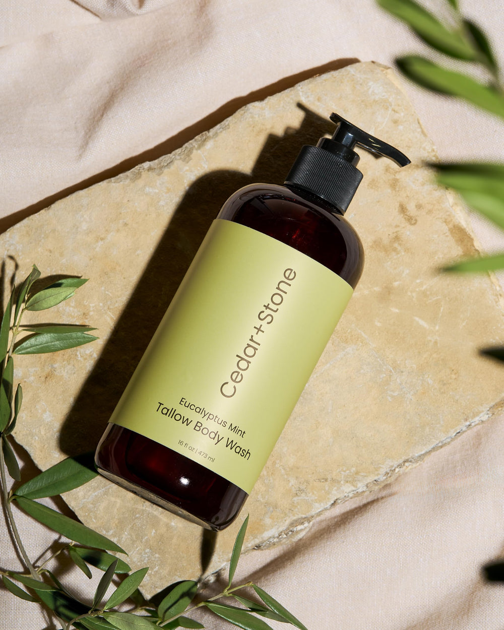 OfficeKit Cedar + Stone Clean Body Wash natural ingredients vibe in product shot.