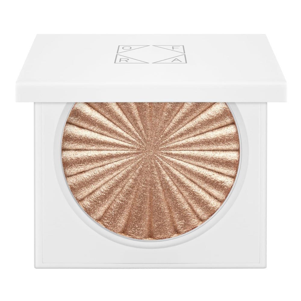 Ofra Glow Goals highlighter compact open shows champagne glow with a smooth finish
