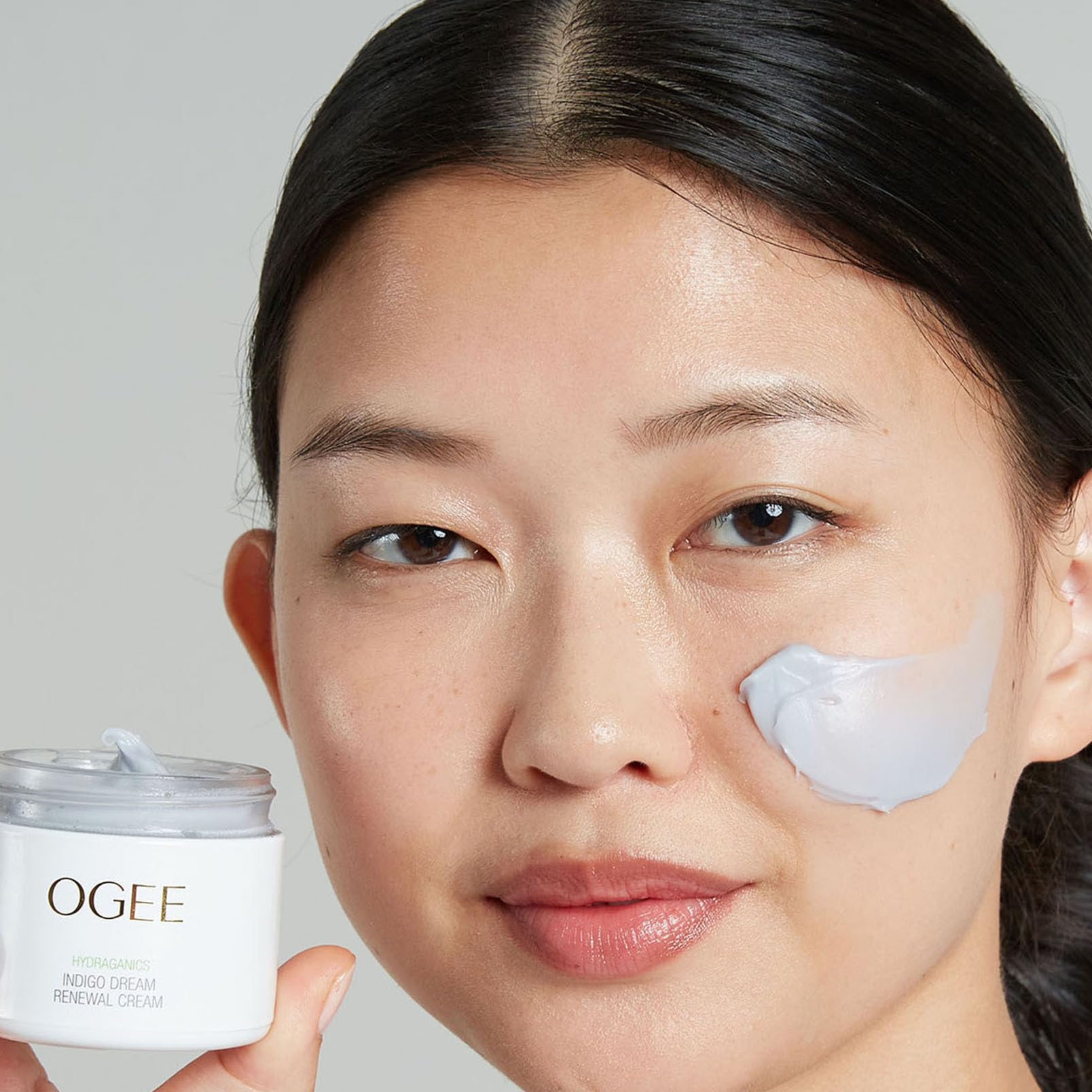 Ogee Indigo Dream Renewal Cream on a bathroom counter offers daily versatility.