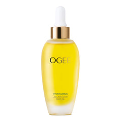 Ogee Jojoba Glow Face Oil bottle pouring for instant hydration and a dewy finish.