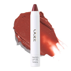 Ogee Nolana lip oil in terracotta brown provides nourishing tint and shine.