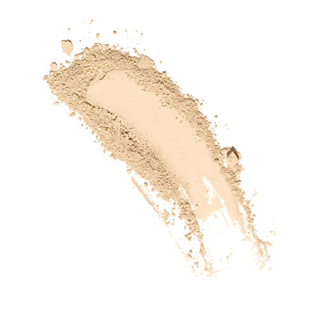 Ogee Dune powder refill close-up showing compact texture for smooth application.