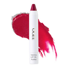 Ogee Tinted Sculpted Lip Oil Azalea bottle shows sheer fuchsia color for daily lip tint.