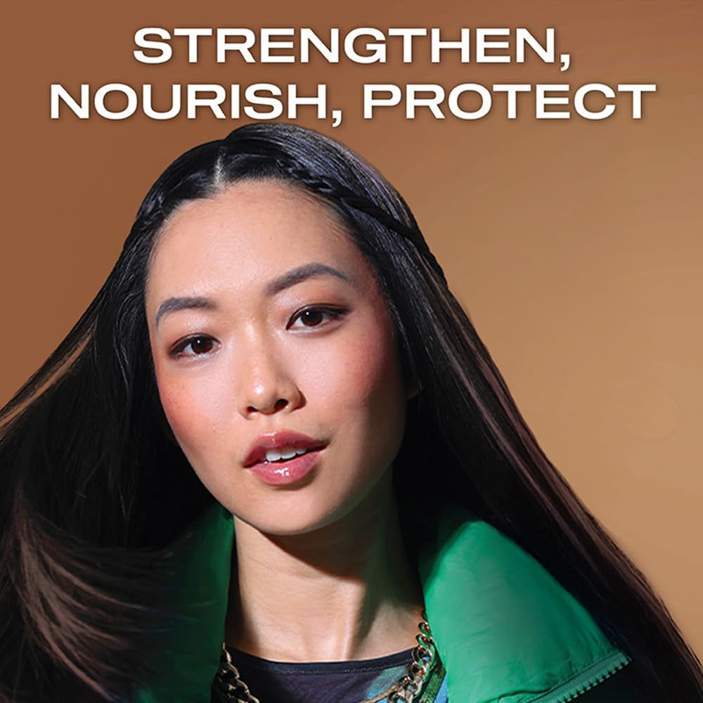 OGX conditioner in use on hair for smoothness and shine