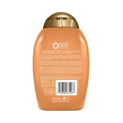 OGX Strength Length Golden Turmeric Conditioner with amla extract nourishes from roots to tips