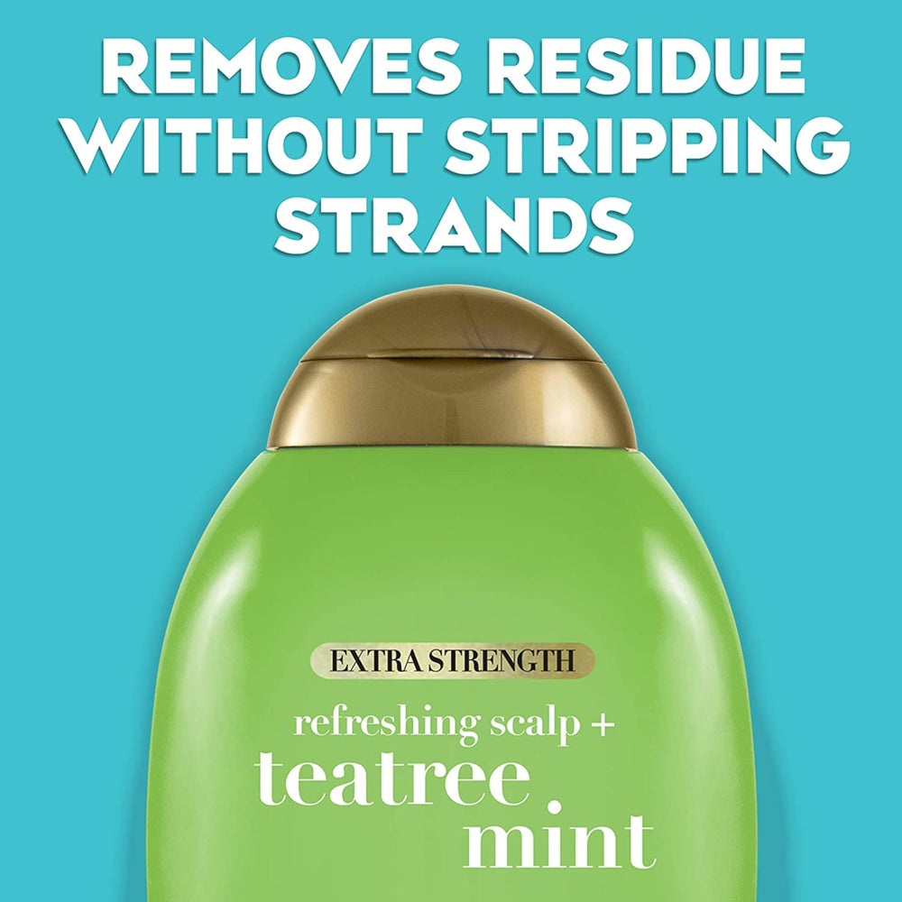 Close-up of OGX Tea Tree Mint Shampoo label with tea tree oil emphasis.