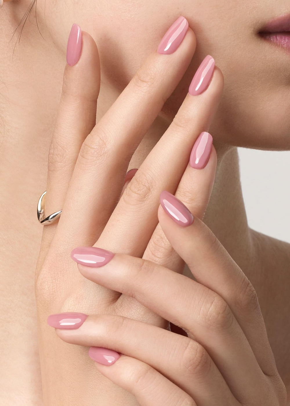 ohora N Bare Plum nails on hand display the purple, glossy finish