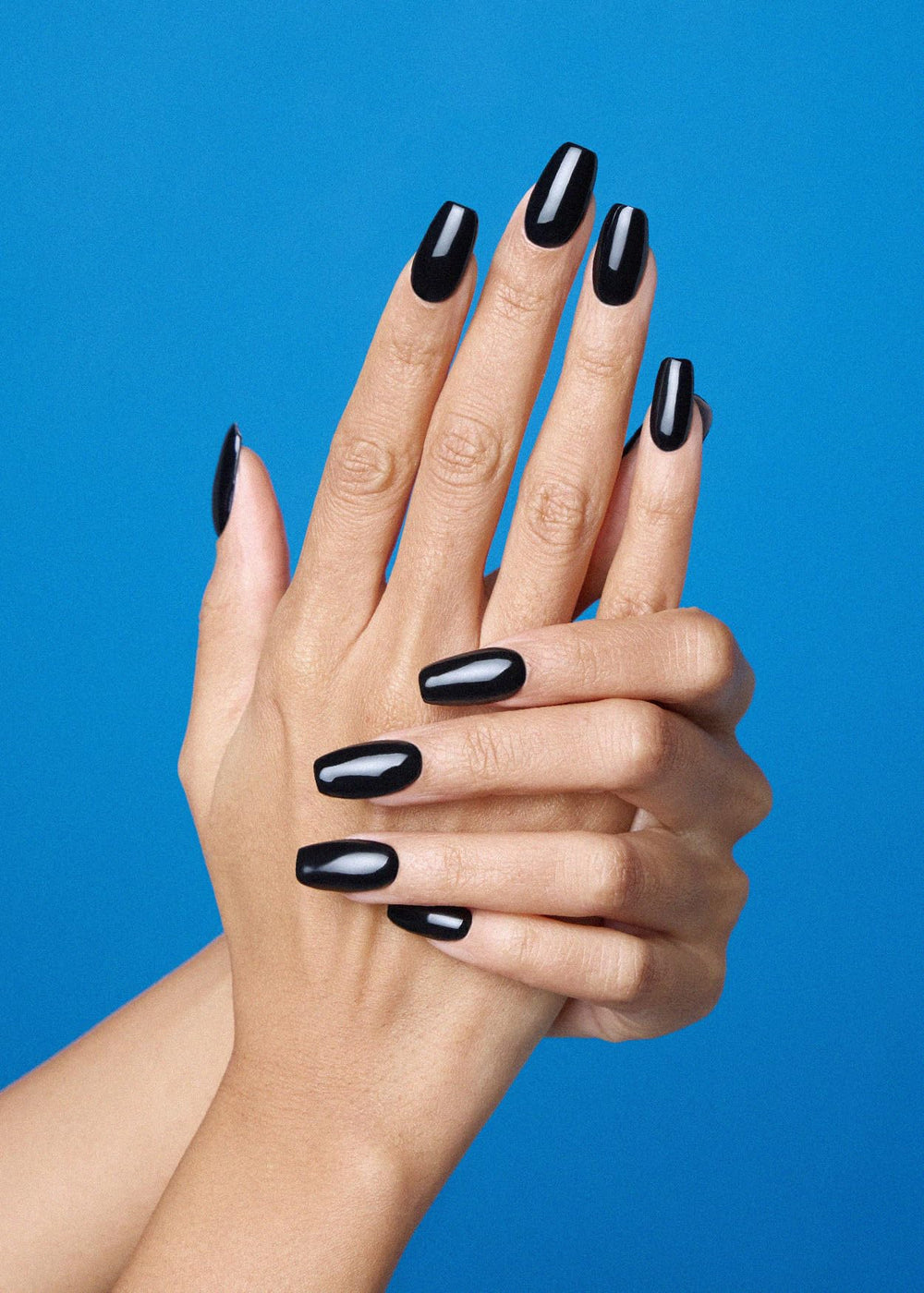 Ohora Onyx dark solid nails close-up showing rich color and shine