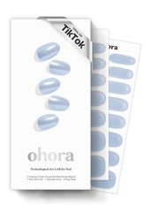Ohora semi-cured gel nail strips in light blue chrome provide a striking, long-lasting look.