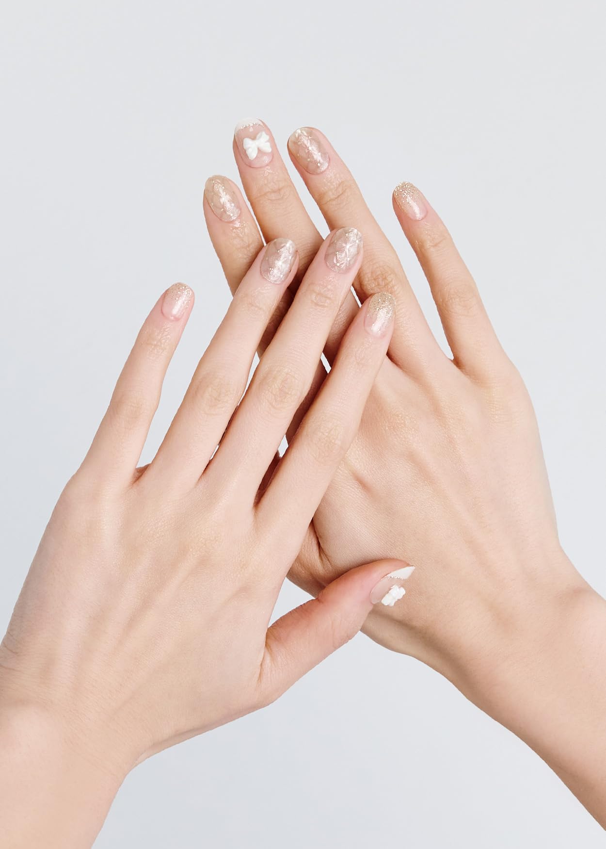ohora N Grace Bloom gem accents on nails for subtle sparkle