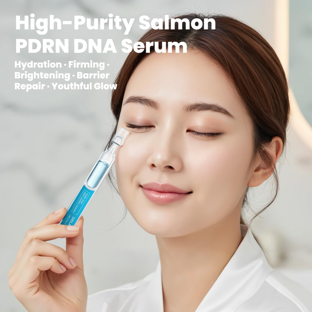 OIDLA Salmon DNA Serum bottle close-up shows sleek design for on-the-go use.