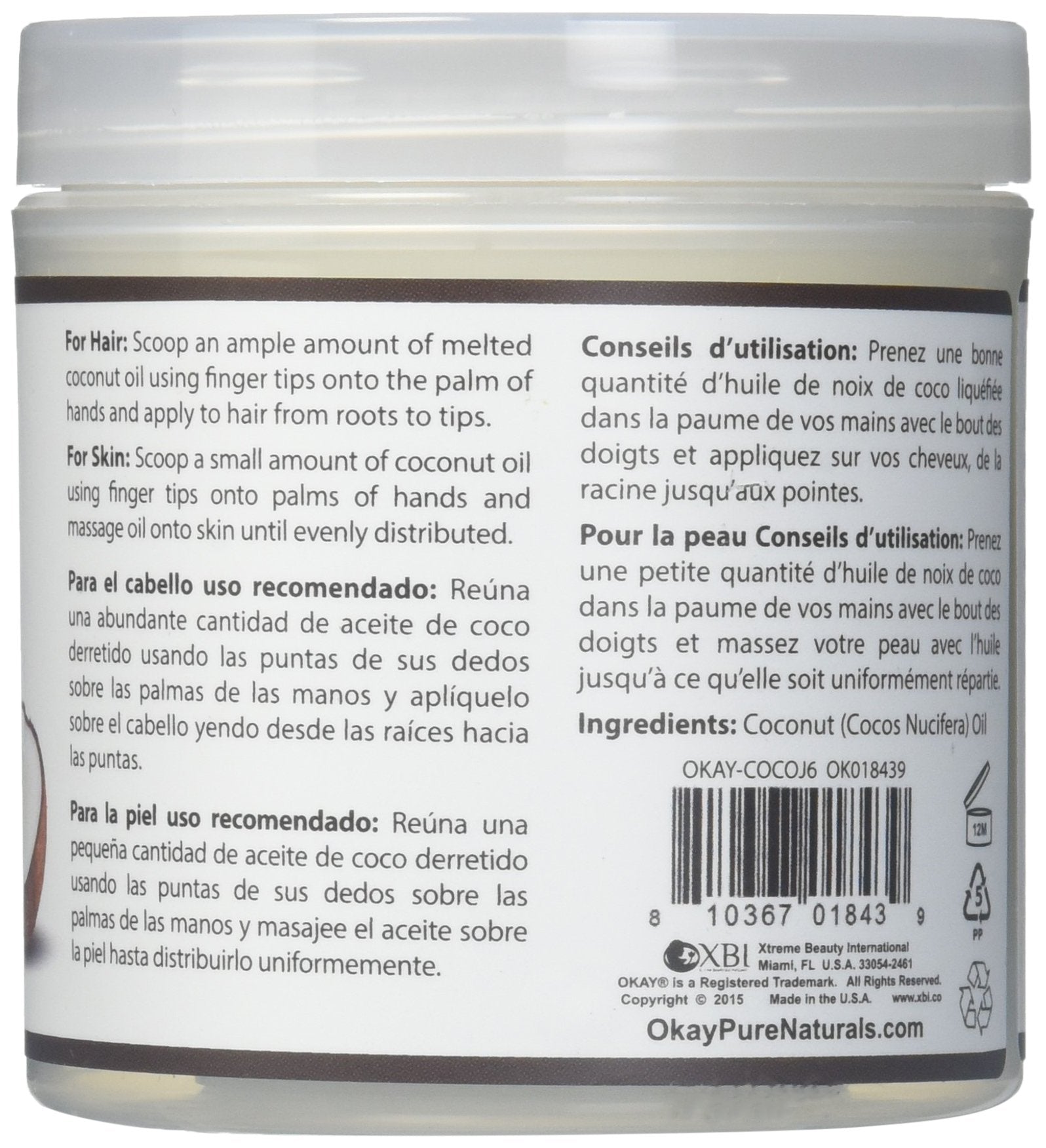 OKAY coconut oil hair application from roots to tips for nourishment.