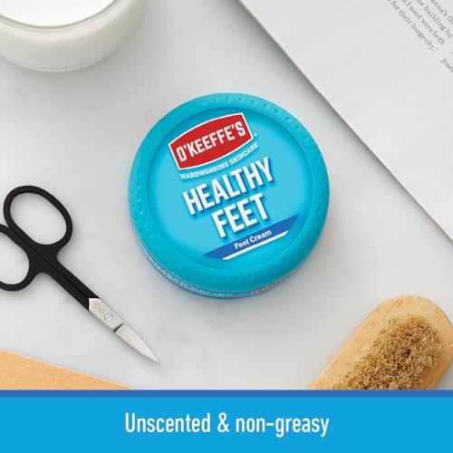 Close-up of cream texture ready to hydrate cracked feet.