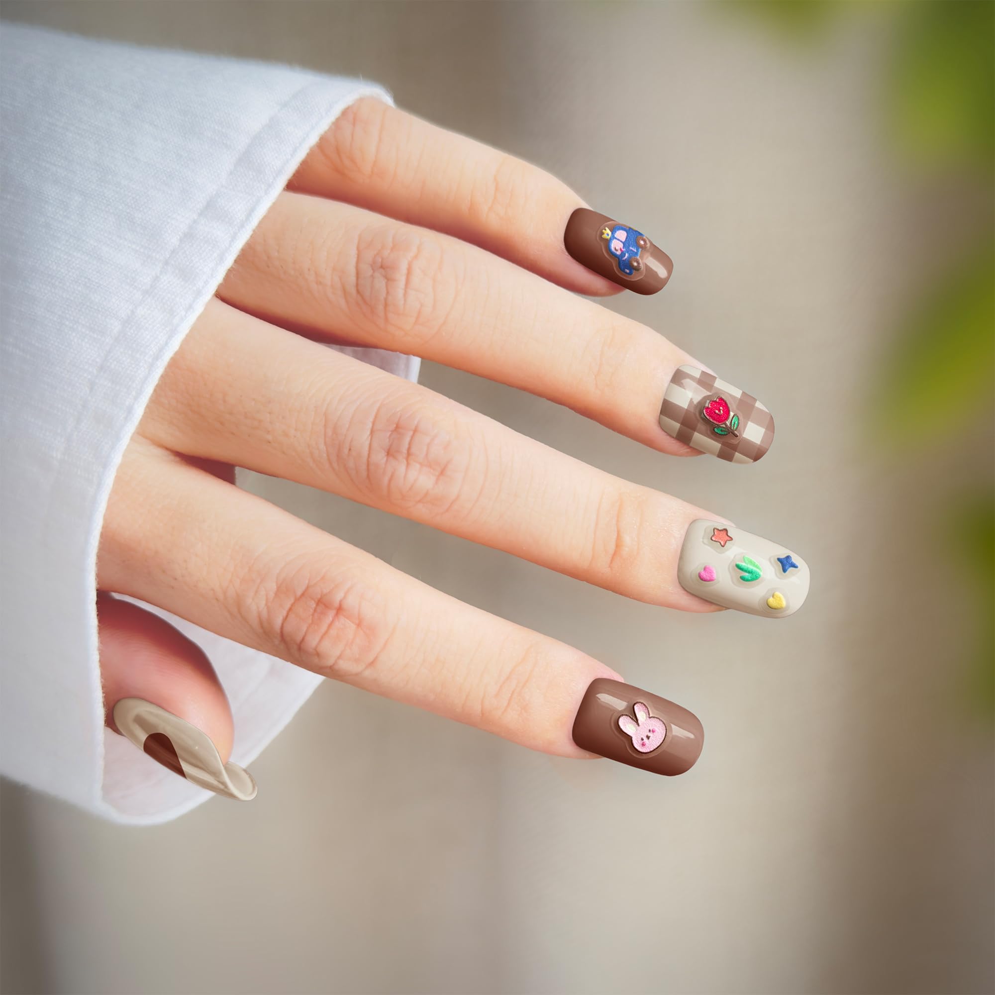 okiYomi 3D nail stickers featuring elephants and toy cars for playful, eye-catching nail art
