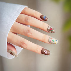 okiYomi 3D nail stickers featuring elephants and toy cars for playful, eye-catching nail art