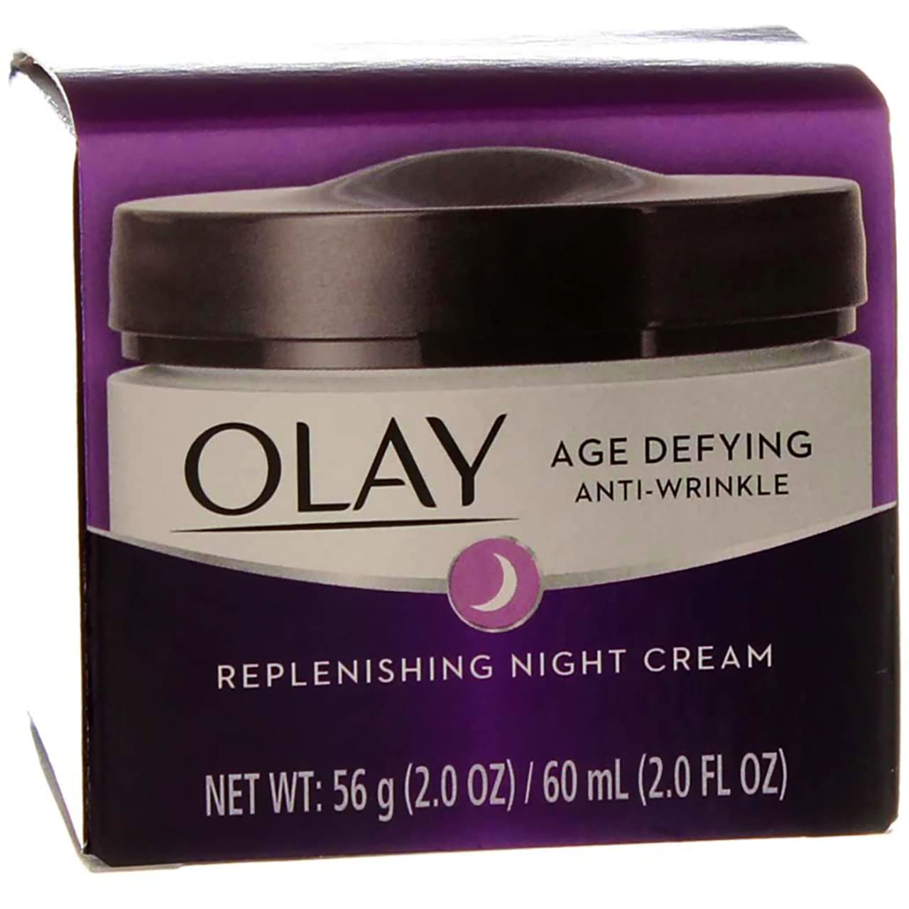 Bottle of Olay night cream on skin illustrating nighttime hydration.