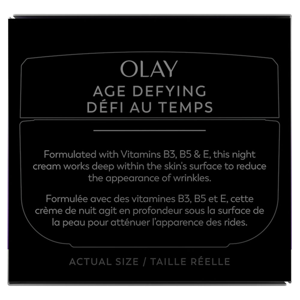 Olay Age Defying night cream used in a nighttime routine setup