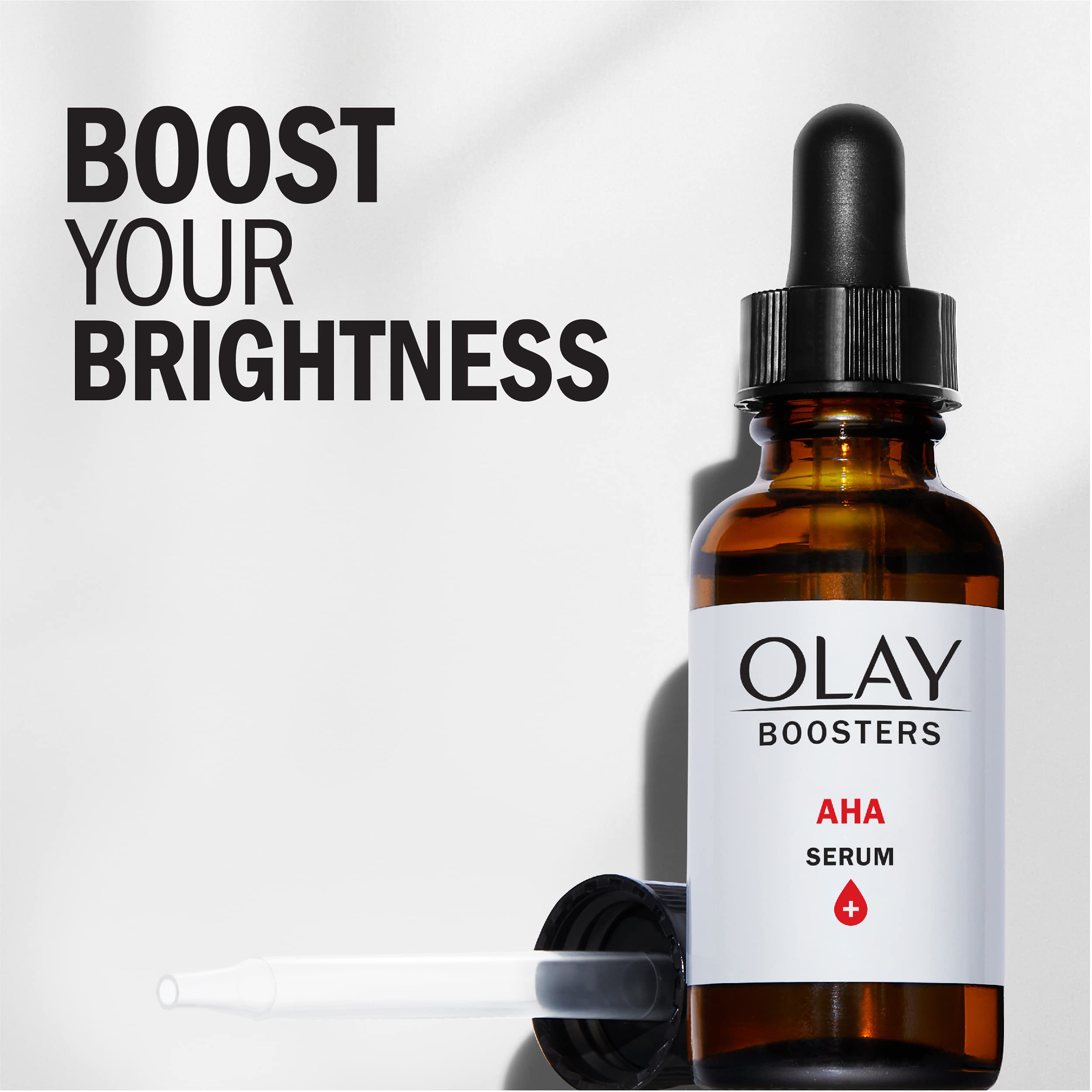 Olay AHA Serum dropper in use for precise application and quick absorption.