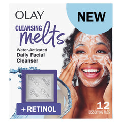 Olay Cleansing Melts pad dissolving in warm water to start a gentle cleanse.