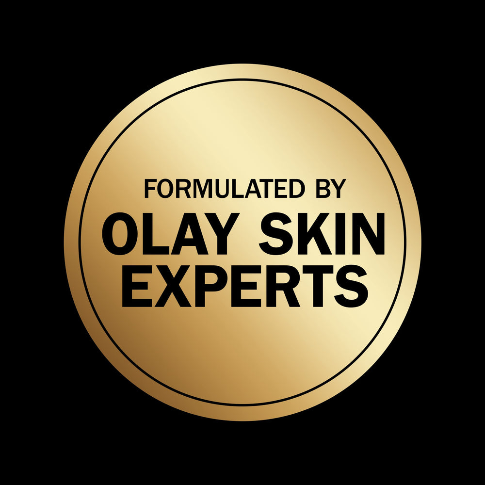 Creamy texture of Olay Hydrating Body Wash captured in close-up.