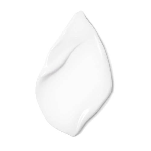 Olay Total Effects 7-in-1 jar close-up showcases branding and cream texture.