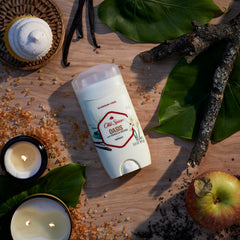 Application swipe shows clear, residue-free deodorant on skin.