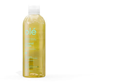 OLÉ onion-ginger shampoo close-up showing natural ingredients for balanced scalp.