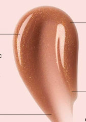 Ole Henriksen Pout Preserve lip treatment Creme Brulee Glimmer tube being applied for smooth, plump looking lips