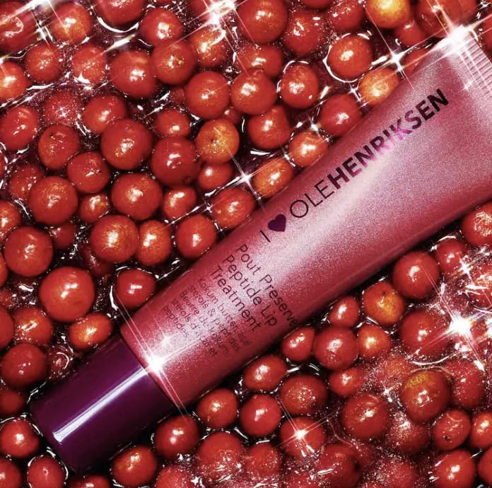 Close-up of Ole Henriksen Pout Preserve ingredients: peptides and kokum butter nourish lips.