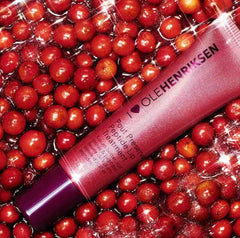Close-up of Ole Henriksen Pout Preserve ingredients: peptides and kokum butter nourish lips.