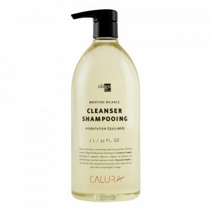 Oligo Professionnel Calura Moisture Balance Cleanser Shampoo bottle pour for color-safe hydration.