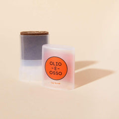OLIO E OSSO lip scrub with coffee beans highlighting natural exfoliation
