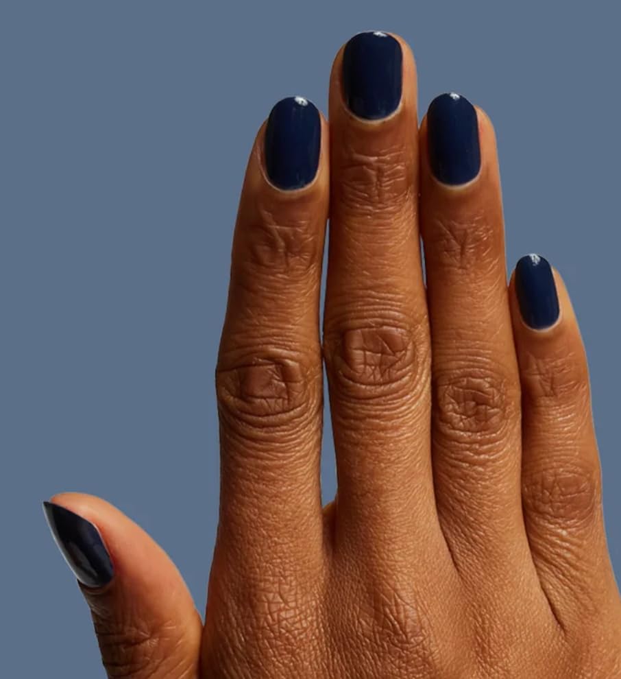 Olive & June Suited Midnight Blue removal example with easy cleanup.