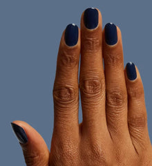 Olive & June Suited Midnight Blue removal example with easy cleanup.