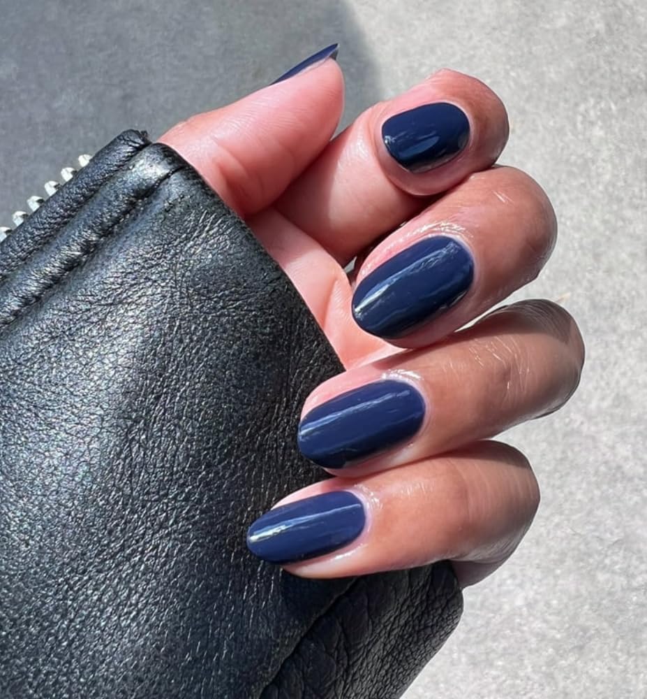 Olive & June Suited Midnight Blue brush stroke showing smooth, streak-free application.