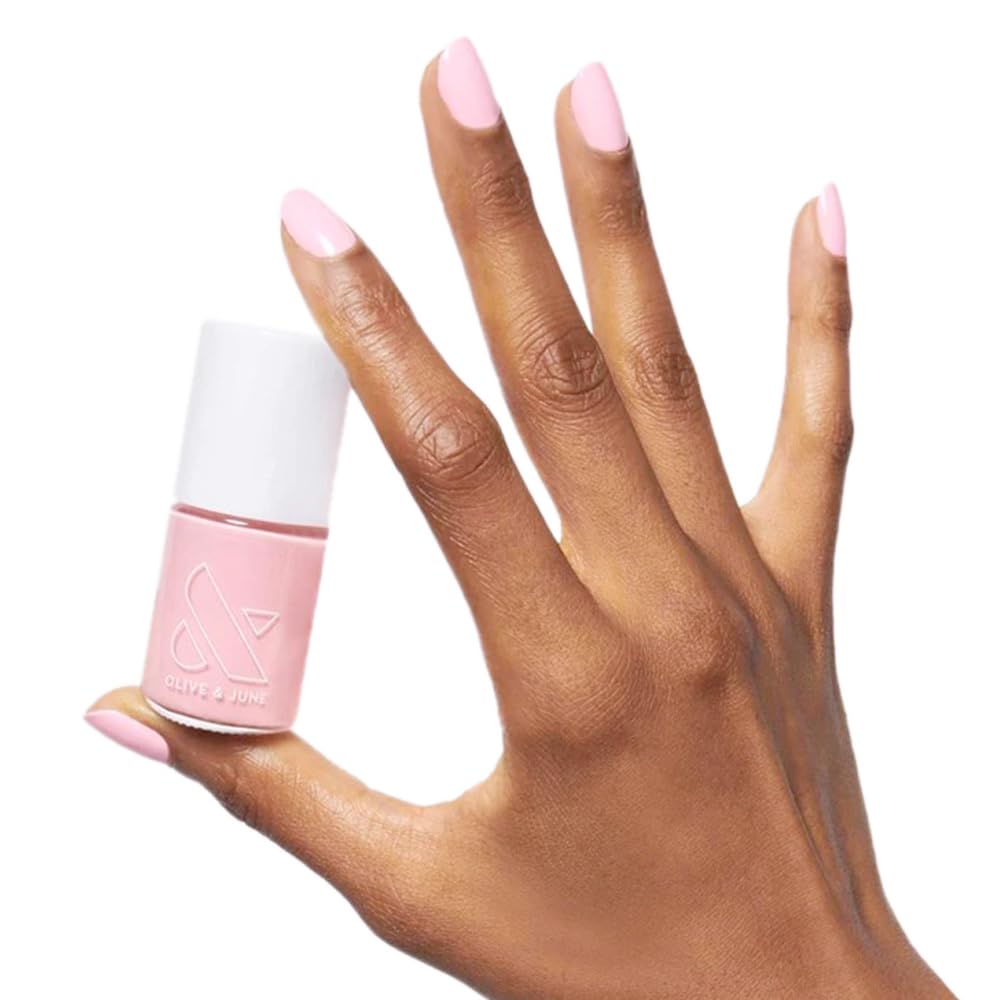 Olive & June Long-Lasting Nail Polish bubbly pink bottle close-up for salon-quality color.